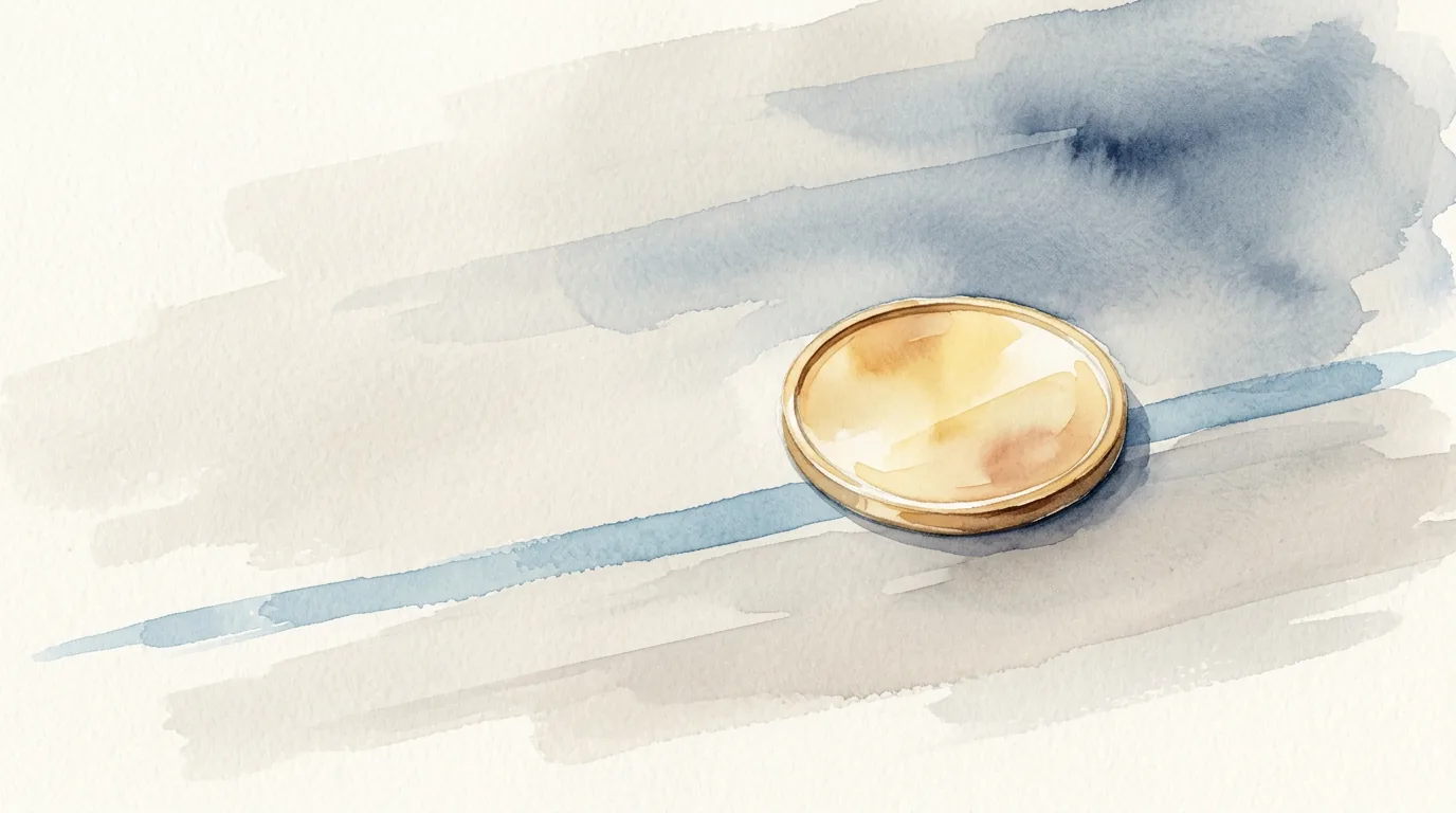 An unmarked gold token rests off-center on a blue reference line that continues in both directions.